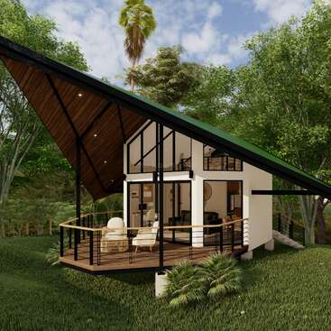 Uma casa moderna em forma de A, com grandes janelas de vidro e um amplo deck de madeira, está situada em meio a árvores frondosas, combinando natureza e arquitetura de forma harmoniosa.