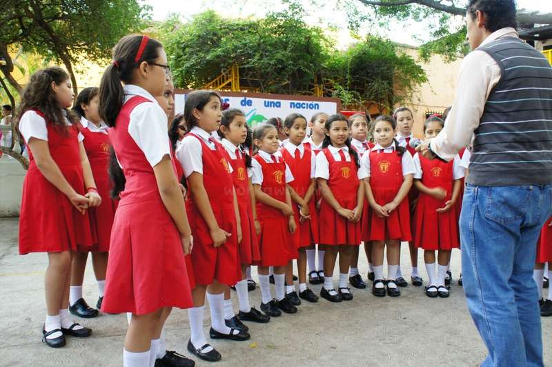 Help teach English to students and teachers at a Christian bilingual