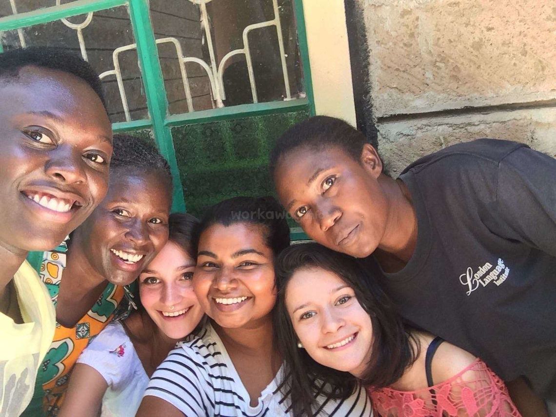 new friends cultural exchange group smiling selfie