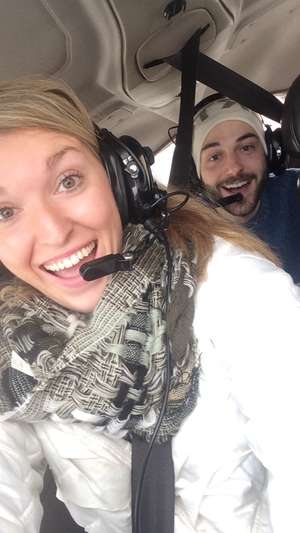 travel bloggers flying a plane