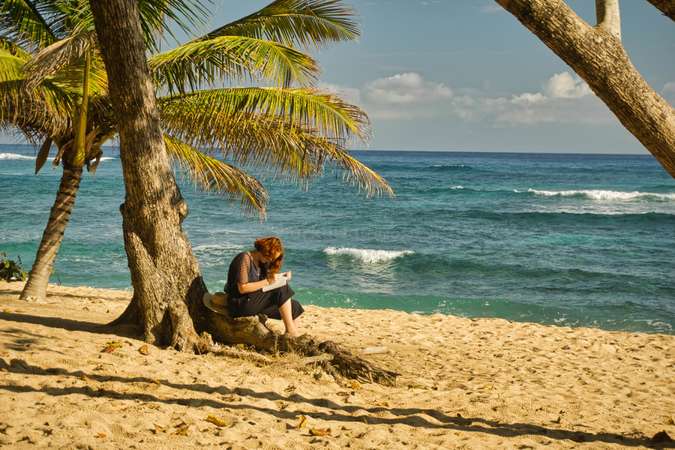 digital nomad book writing tropical beach