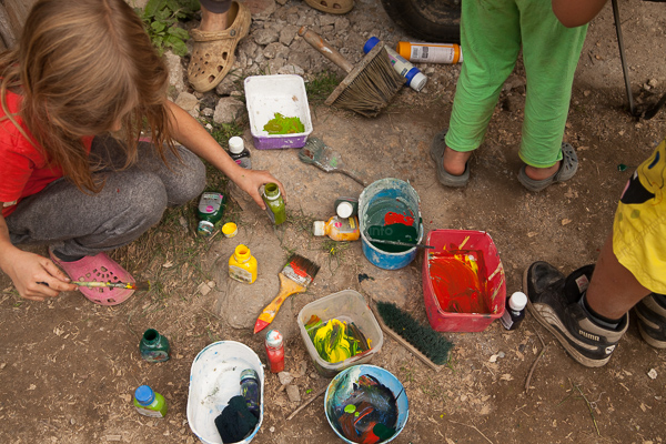 artistic fun workaway children out in nature mixing paint homeschooling fun