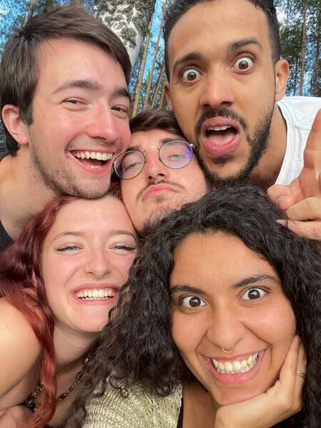 multicultural friendship selfie in the woods