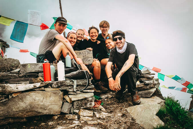 group of hikers smiling after hike in kyanjing ri