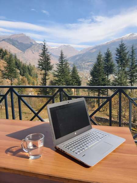 patio view working on laptop