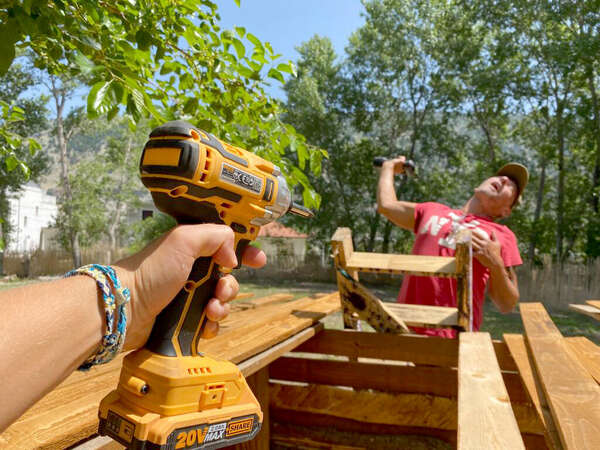 building with tools and play around in a garden